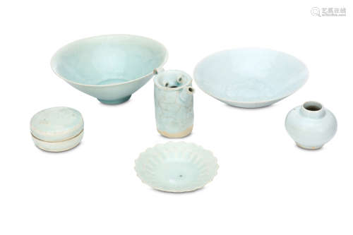 SIX CHINESE QINGBAI ITEMS. Song Dynasty. Comprising two bowls, a foliate rim ribbed dish, a jar, a