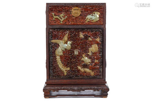 A CHINESE JADE-INLAID HARDWOOD CHEST. Decorated to the removable front with confronting a