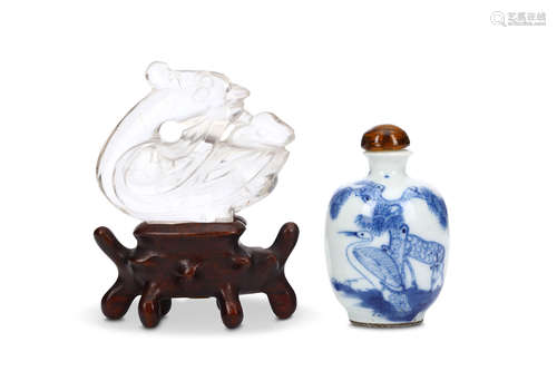 A CHINESE BLUE AND WHITE SNUFF BOTTLE TOGETHER WITH A ROCK CRYSTAL BIRD. Qing Dynasty. The bottle