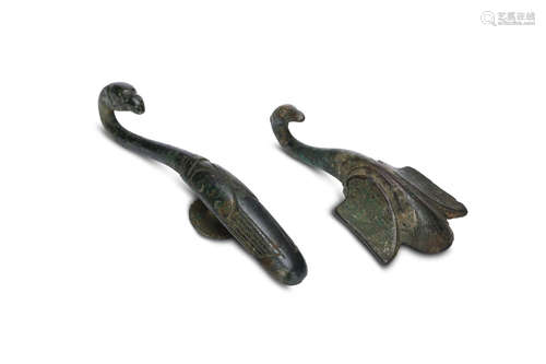 TWO CHINESE BRONZE BIRD HEAD TERMINAL BELT HOOKS. Song Dynasty. Each with a bird head terminal,