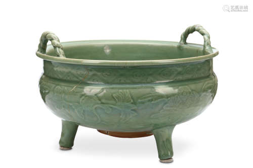A CHINESE LARGE LONGQUAN CELADON GLAZED TRIPOD CENSER. Ming Dynasty. The compressed bowl incised