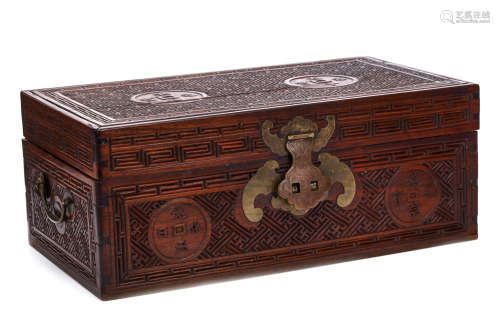 A CHINESE CARVED WOOD ‘COINS’ BOX AND COVER. The sides and top incised with circular coins against a