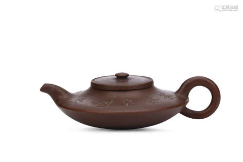 A CHINESE YIXING ZESHA TEAPOT AND COVER. Of squat form, with a deeply rounded body and sharply