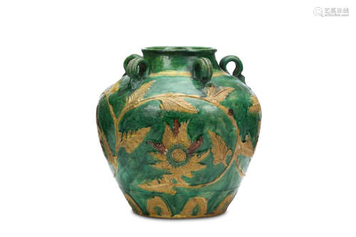 A SANCAI JAR. Ming Dynasty, 16th Century. Incised with scrolling flowering foliage, the shoulders