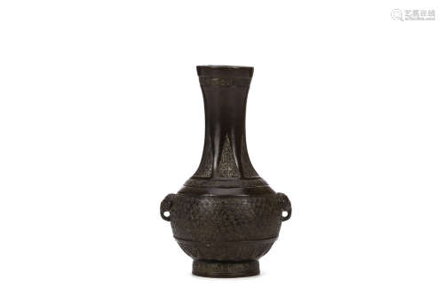 A SMALL CHINESE BRONZE VASE. Yuan Dynasty. The rounded body rising to a flaring neck set with two