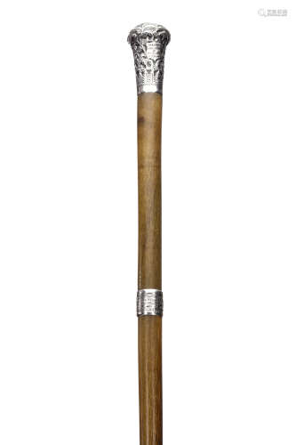 A SILVER MOUNTED RHINOCEROS HORN WALKING CANE. circa 1900. Inscribed made in Zanzibar by Alidina