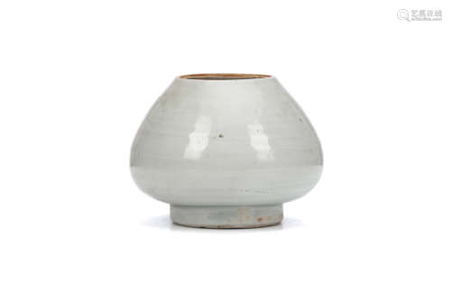 A CHINESE QINGBAI WATERPOT. Song Dynasty. The short foot rising to a rounded body and covered in a