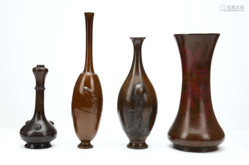 FOUR BRONZE VASES. 19th Century. Of various shapes and decoration, including a tall neck vase