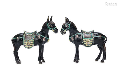 A PAIR OF CHINESE FAMILLE NOIRE HORSES. Qing Dynasty, 19th Century. Each standing with the ears