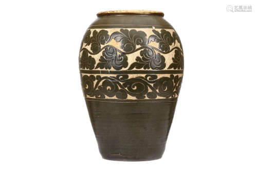 A CHINESE LARGE 'CIZHOU' SGRAFFIATO 'FLORAL' JAR. Song Dynasty. The globular body rising from a