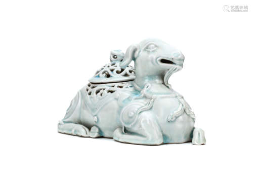A CHINESE PALE CELADON 'GOAT' CENSER AND COVER. Qing Dynasty, 19th Century. Seated with the head