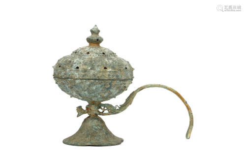 A CHINESE BRONZE CENSER. Song Dynasty. The rounded body supported on a conical lotus leaf-form base,