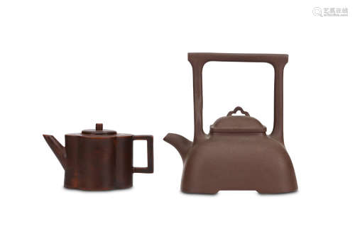 TWO CHINESE YIXING TEAPOTS AND COVERS. One of quatrefoil section with a rectangular handle and