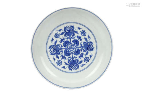 A CHIENSE BLUE AND WHITE DISH. Qing Dynasty, Yongzheng mark and of the period. With curved sides