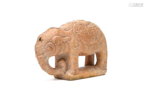 A CHINSE STONE CARVING OF AN ELEPHANT. Probably Yuan Dynasty. Carved standing four square with a