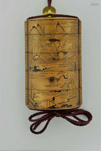 A GOLD LACQUER FOUR-CASE INRO. 19th Century. Decorated with a Chinese-style mountain landscape