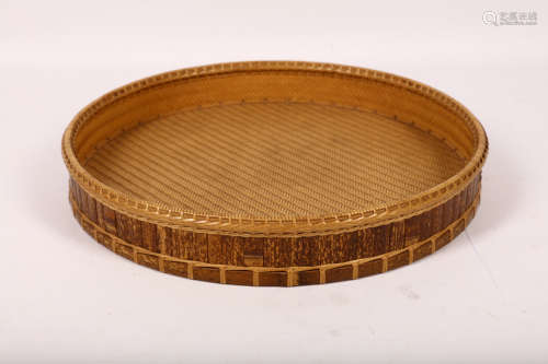 A FINE BAMBOO TEA TRAY BY CHIKKOSAI. Meiji period. A chabon of a circular form, woven in herringbone
