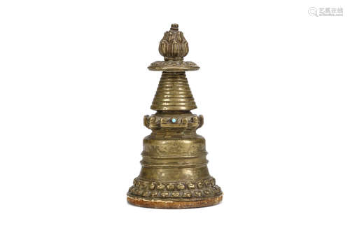 A SMALL KADAMPA STYLE BRONZE STUPA. Tibet, circa 14th Century. The bell-shaped body supported by a