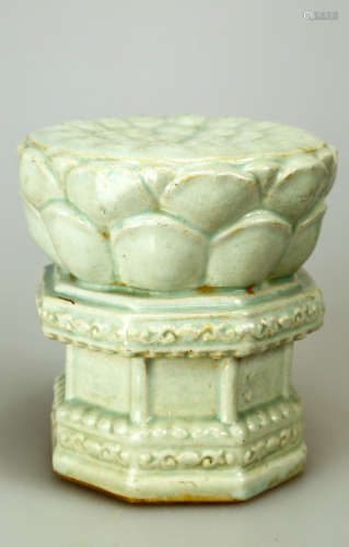 A YINGQING LOTUS-SEAT WITH INCISED FLOWERS DECORATION.