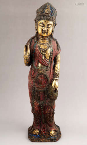 A GILT- LACQUERED METAL FIGURE OF GUANYIN BUDDHA.