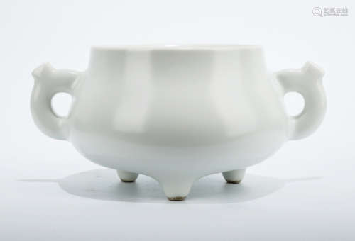 A BLANC-DE-CHINA TRIPOD CENSER WITH TWO EARHANDLES.THE