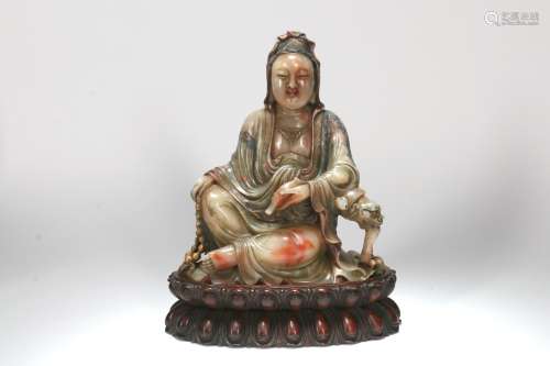 A Chinese Carved Stone Buddha