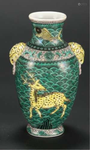 A Chinese Dark Green Glazed Porcelain Vase