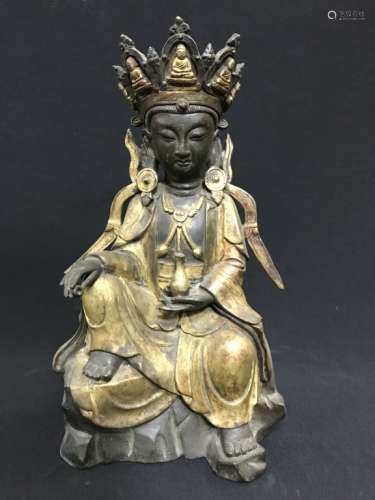 A GILT-BRONZE FIGURE OF GUANYIN