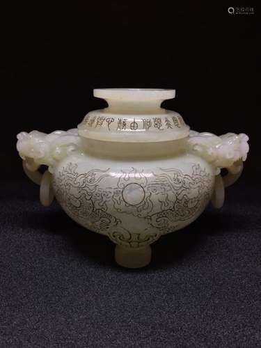 A JADE INCISED 'DRAGON' TRIPOD CENSER