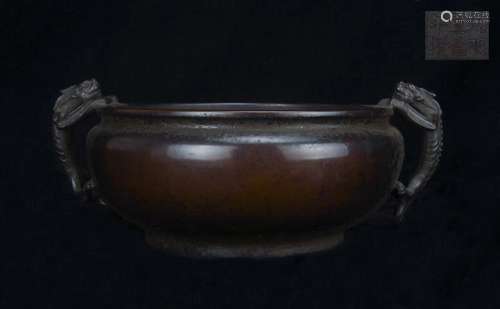 A BRONZE TRIPOD CENSER