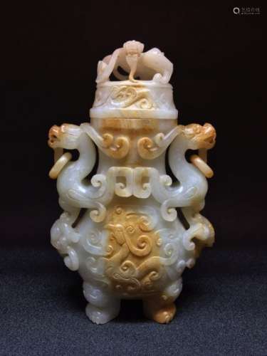 A JADE CARVED VASE AND COVER