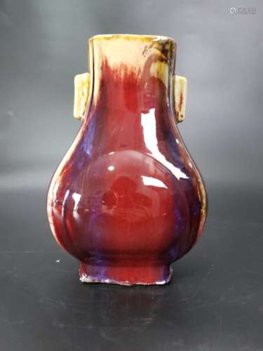 A FLAMBE-GLAZE FACETED VASE