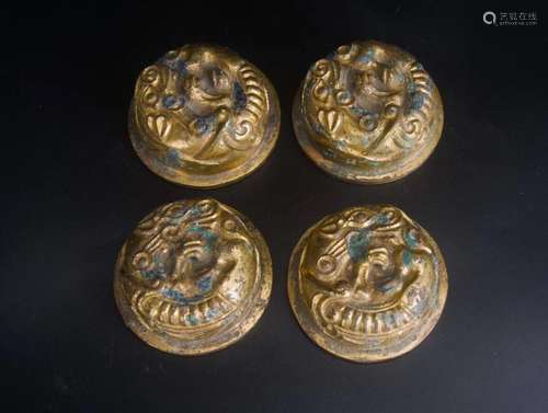 FOUR GILT-BRONZE PAPER WEIGHT