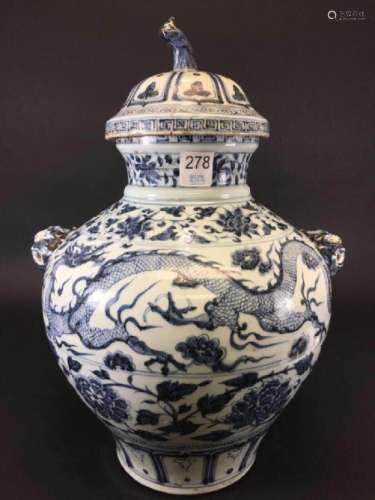 A BLUE AND WHITE JAR AND COVER