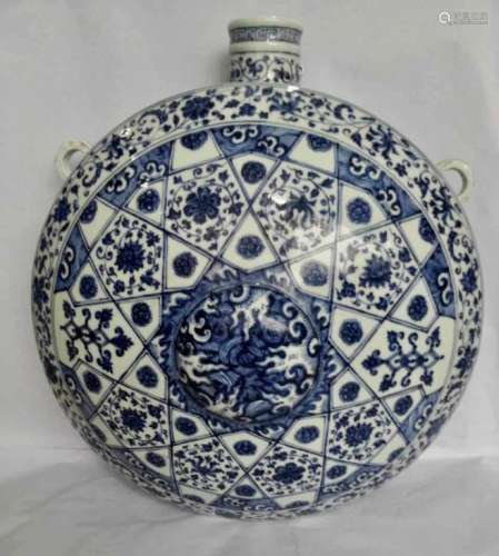 A BLUE AND WHITE WALL VASE