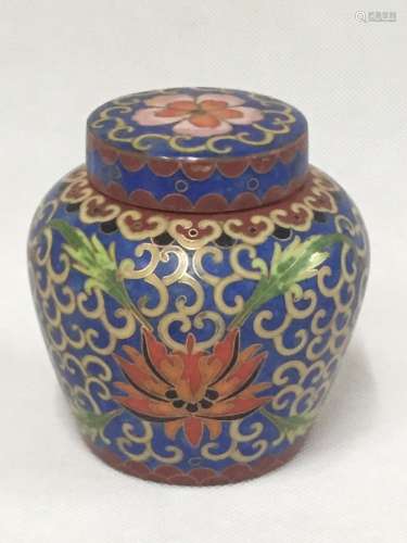 A GILT-DECORATED JAR AND COVER