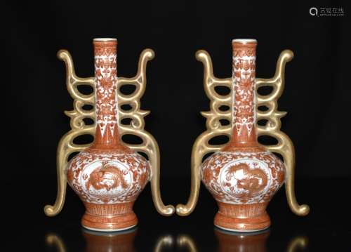 A PAIR OF CORAL-RED WALL VASE