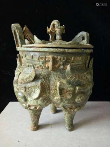 A BRONZE VESSEL AND COVER