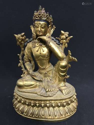 A GILT-BRONZE FIGURE OF GUANYIN