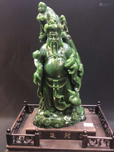 A Carved Green Jade Buddha