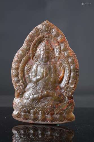 A Red Jade Buddha Statue