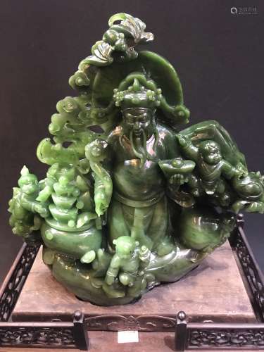 A Carved Green Jade Buddha