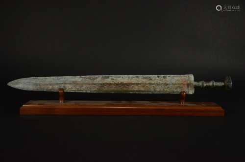A Carved Bronze Sword