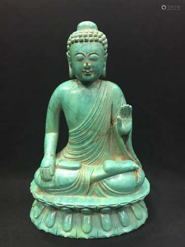 A Green Stone Buddha Sculpture