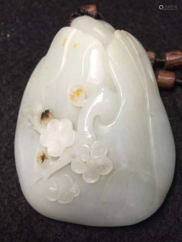 A Carved Jade Pendant