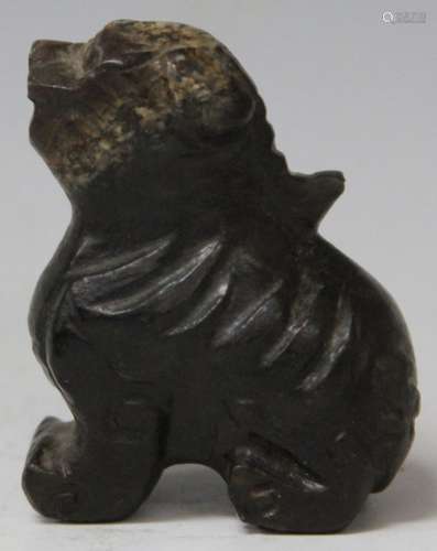 EARLY CHINESE CARVED JADE LION