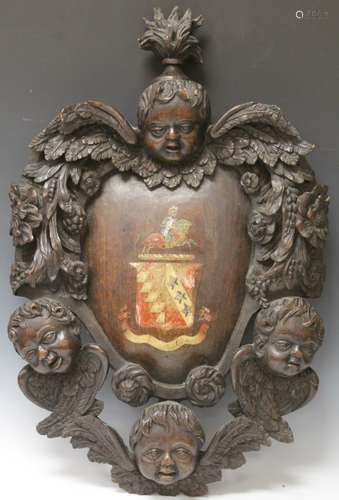 CONTINENTAL CARVED WALNUT COAT OF ARMS, 19TH C.