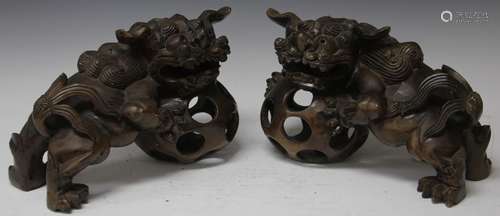 PAIR OF CHINESE CARVED WOOD FOO LIONS