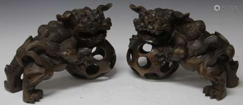 PAIR OF CHINESE CARVED WOOD FOO LIONS