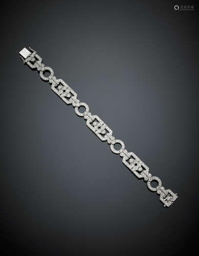 White gold diamond modular bracelet, g 25, length cm 17, h cm 1.10 circa. Inscriptions on the clasp